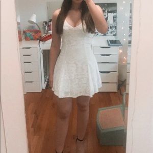 white velvet strappy back fit in flare dress